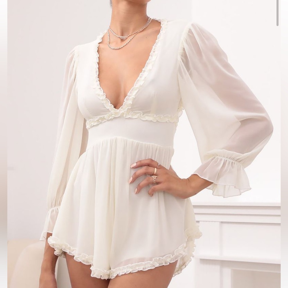 Ruched Ruffle Romper in Ivory
LUCY IN THE SKY